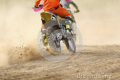 Motocross racer accelerating speed Stock Photo
