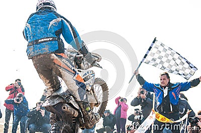 Motocross racer on finish Editorial Stock Photo