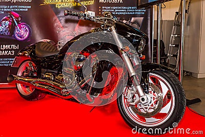Motopark-2015 (BikePark-2015). The exhibition stand of tuning motorcycles (bikes). The motorcycle (bike) with lights. Editorial Stock Photo