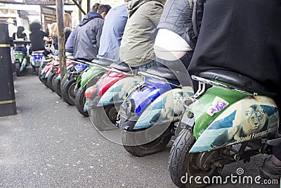 Motor bikes are seats in Camden market London Editorial Stock Photo