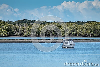 A motor boat moored in Pumicestone Passage, Queensland, Australia Stock Photo