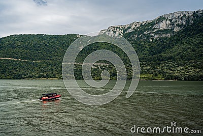 Motor boat moving on the beautiful lake Editorial Stock Photo