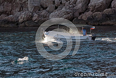 Motor boat at sea in evening time Stock Photo