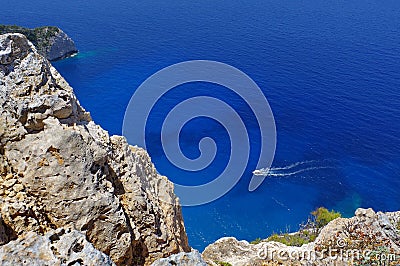 Motor boating on blue water - Zakynthos Island, landmark attraction in Greece. Ionian Sea. Seascape Stock Photo