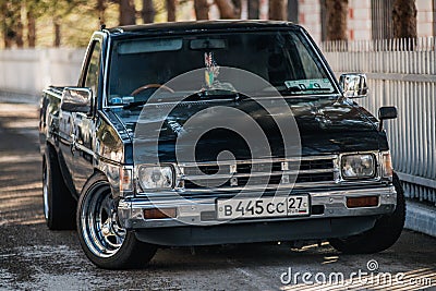 Motor car Nissan Datsun pickup truck at the city street Editorial Stock Photo