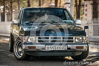 Motor car Nissan Datsun pickup truck at the city street Editorial Stock Photo