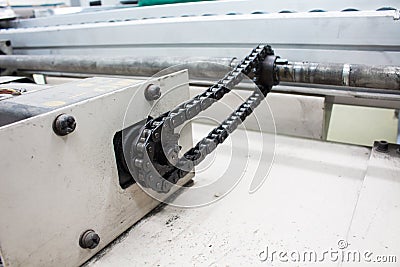 Motor chain drive shaft in conveyor line Stock Photo