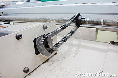 Motor chain drive shaft in conveyor line Stock Photo