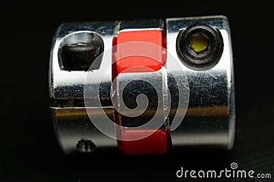 Motor coupling to reduce vibration and smooth start and running of mechanism. Stock Photo