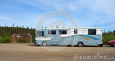 A motor home parked at the beginning of the road leading to prudhoe bay Editorial Stock Photo