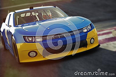 Motor sports race car Front angled view speeding down a track .Generic race car, Stock Photo