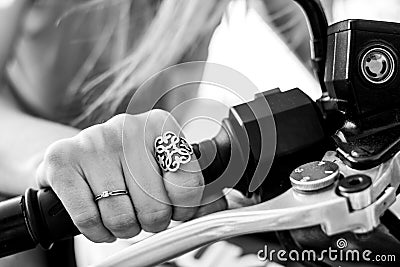 Motorbike details, woman riding on bike. Stock Photo