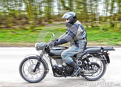 Motorbike with rider Stock Photo