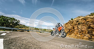 Motorbike on the road riding. having fun driving the empty highway on a motorcycle tour journey Stock Photo