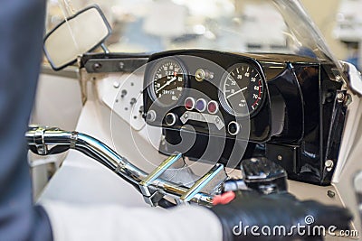 Motorbike speedometer, tachometer. Speedometer of Motorcycle on a steering bike. Motorcycle control panel with speedometer Stock Photo