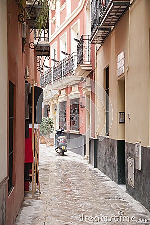 Motorbike in Street in the Santa Cruz Neighbourhood of Seville Stock Photo