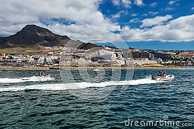 Motorboating in the deep-blue waters off the west coast of Tenerife, one of many leisure activities offered to tourists in the Can Editorial Stock Photo