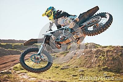 Motorcross, air jump and offroad sports stunt, speed challenge and desert rally. Driver, cycling and freedom on dirt Stock Photo