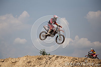 Motorcross riders jump Editorial Stock Photo