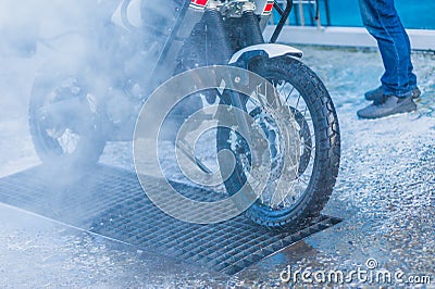 Motorcycle Car Wash Motorcycle Big Bike cleaning with foam injection Stock Photo