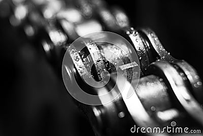 Motorcycle chain in macro, black and white. Artsy. Stock Photo