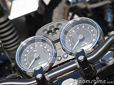 Motorcycle dash display instruments with speedometer and tachometer Stock Photo