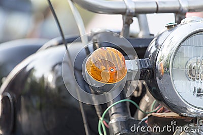 Motorcycle detail. Orange rotating light Stock Photo