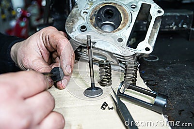 Motorcycle engine repair , overhaul and reconditioning Stock Photo