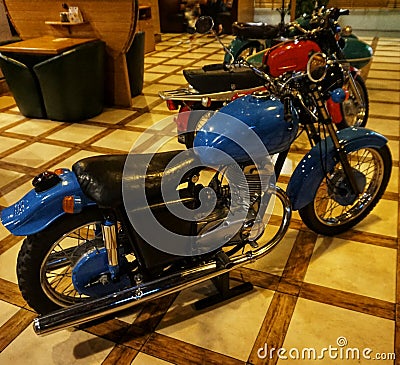 Motorcycle `Java`, which is an undefined element of the design of a pub or bar Editorial Stock Photo