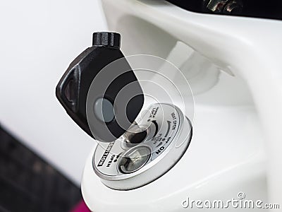 Motorcycle key in ignition Stock Photo