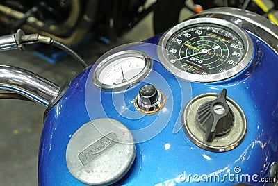 Motorcycle meter panel. Contain many indicators such as odometer, speed, rpm, fuel level etc. Editorial Stock Photo