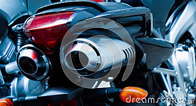 Motorcycle pair exhaust pipes, mufflers close-up Stock Photo