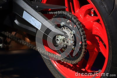 Motorcycle rear wheel chain drive, close-up Editorial Stock Photo