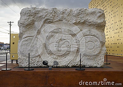 Motorcycle relief carved in stone by internationally renowned multi-media sculptor Eliseo Garcia in Dallas, Texas Editorial Stock Photo