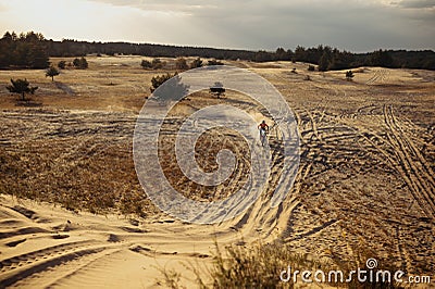 Motorcycle riding in sand dune top view Stock Photo
