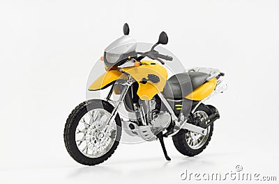 Motorcycle scale model toy closeup - BMW F650 GS - white background - detailed and realistic plastic figurine Stock Photo