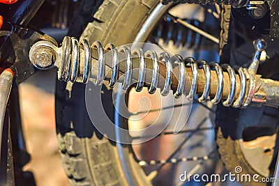 Motorcycle shock absorber close up, spring mechanism Stock Photo