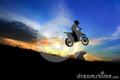 Motorcycle silhouette are jumping Stock Photo