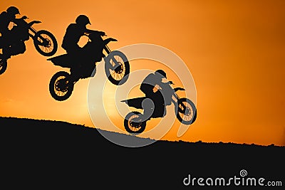 Motorcycle silhouette are jumping Stock Photo