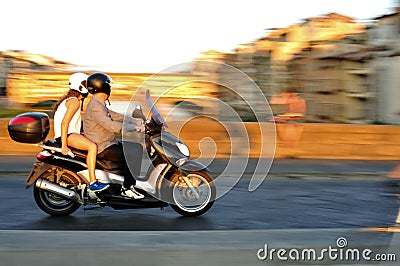 Motorcycle in traffic in Florence city in Italy Editorial Stock Photo