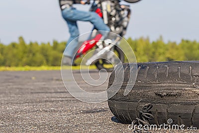 Motorcycle Tricks on unused runway Stock Photo