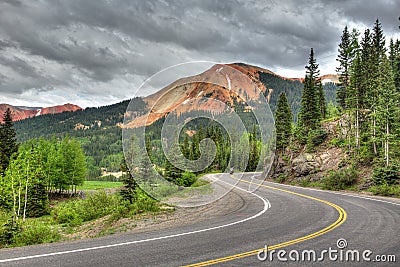 Motorcycle on a winding mountain road Stock Photo