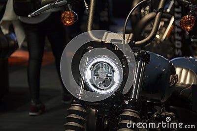 Motorcycles expo in Milan EICMA show Harley Davidson led headlight Editorial Stock Photo