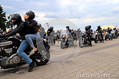 Motorcyclists on Cool Motorbikes, in helmets and leather jackets, open the motorcycle season, Motorcycling in Motorcycle Racing Editorial Stock Photo