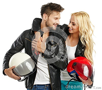 Motorcyclists couple with helmets Stock Photo