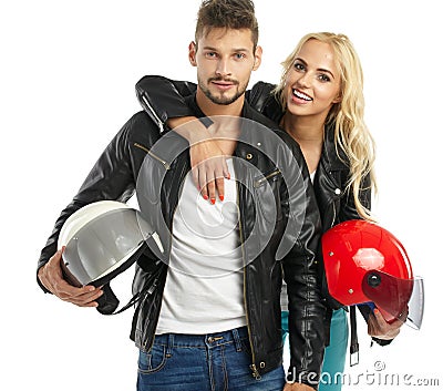 Motorcyclists couple with helmets Stock Photo