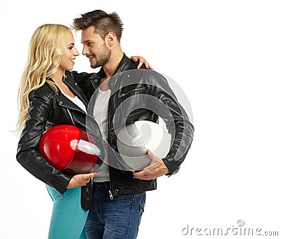 Motorcyclists couple with helmets Stock Photo