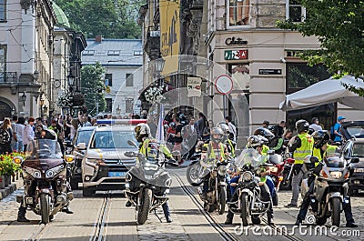 LVIV, UKRAINE - MAY 2018: Motorcyclists ride around the city in a column accompanied by police Editorial Stock Photo