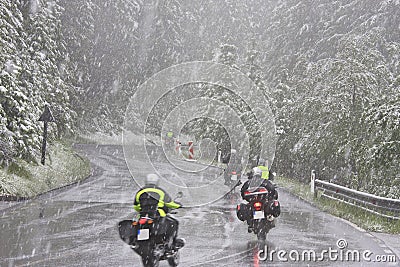 Motorcyclists in a snowstorm, Austria Stock Photo
