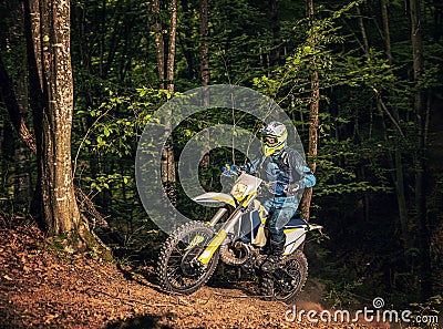 Motorcyclists trains in the forest Stock Photo